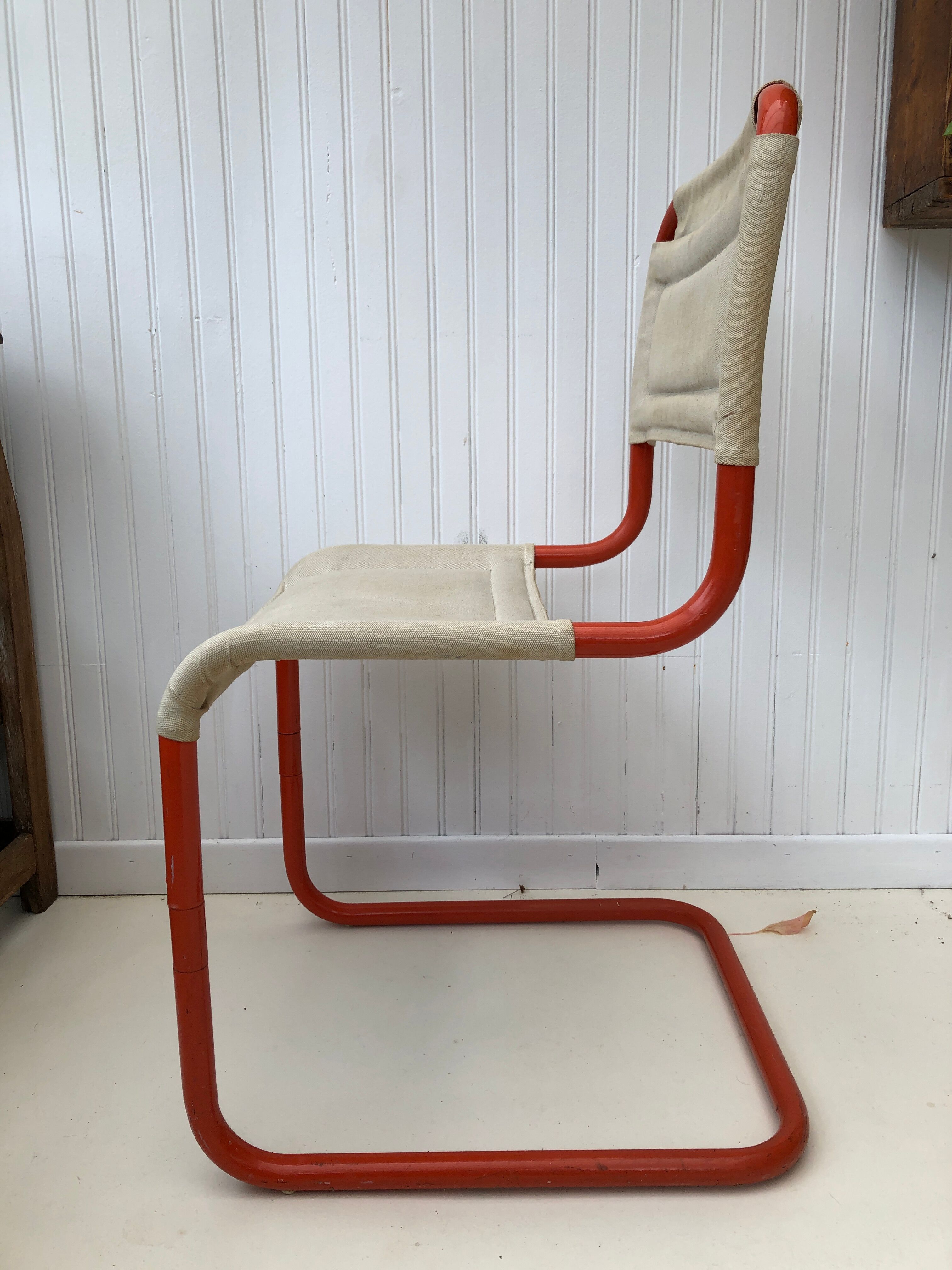 Orange tube chair