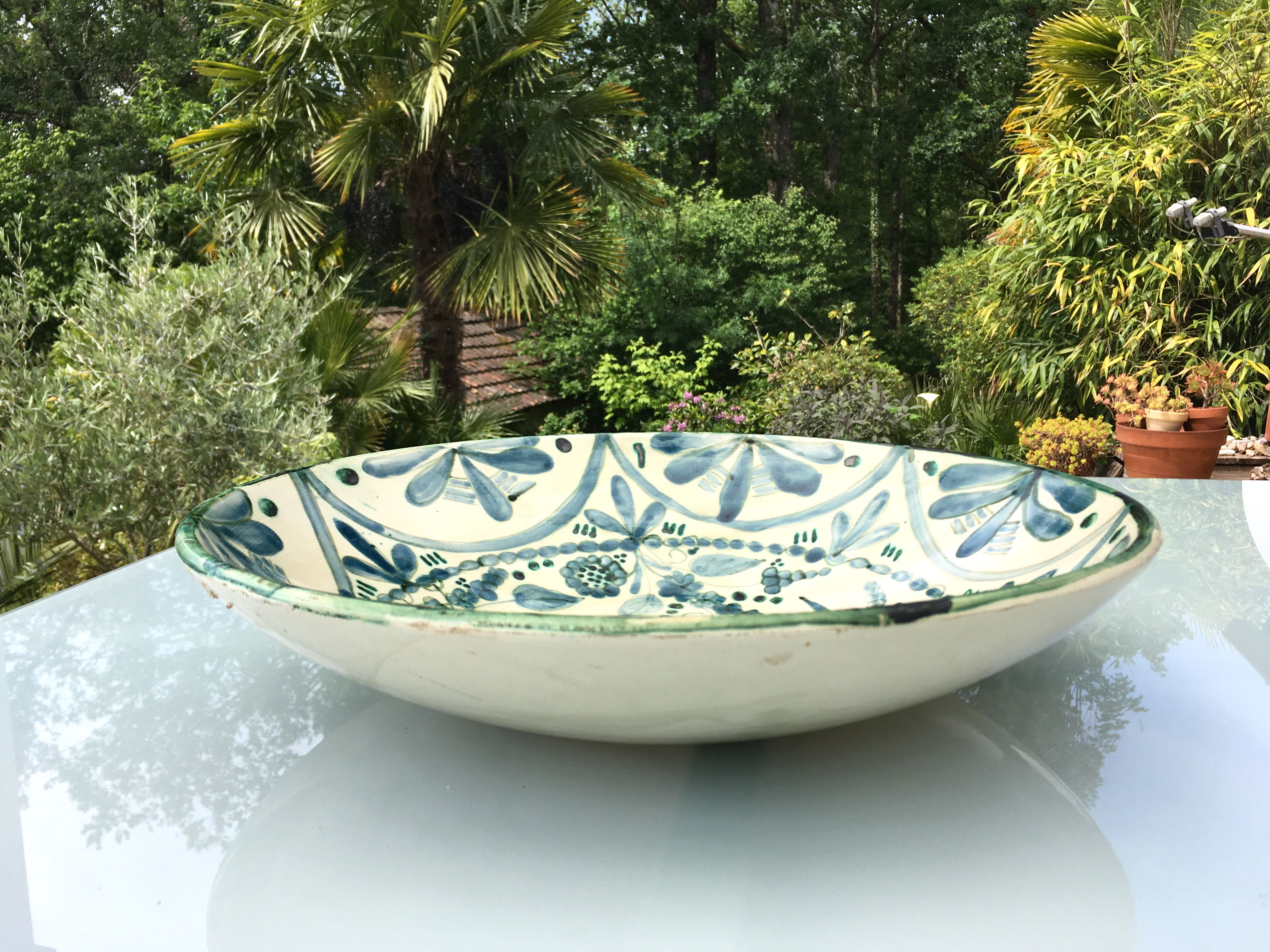 Large ceramic fruit cup with blue peacock