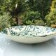 Large ceramic fruit cup with blue peacock