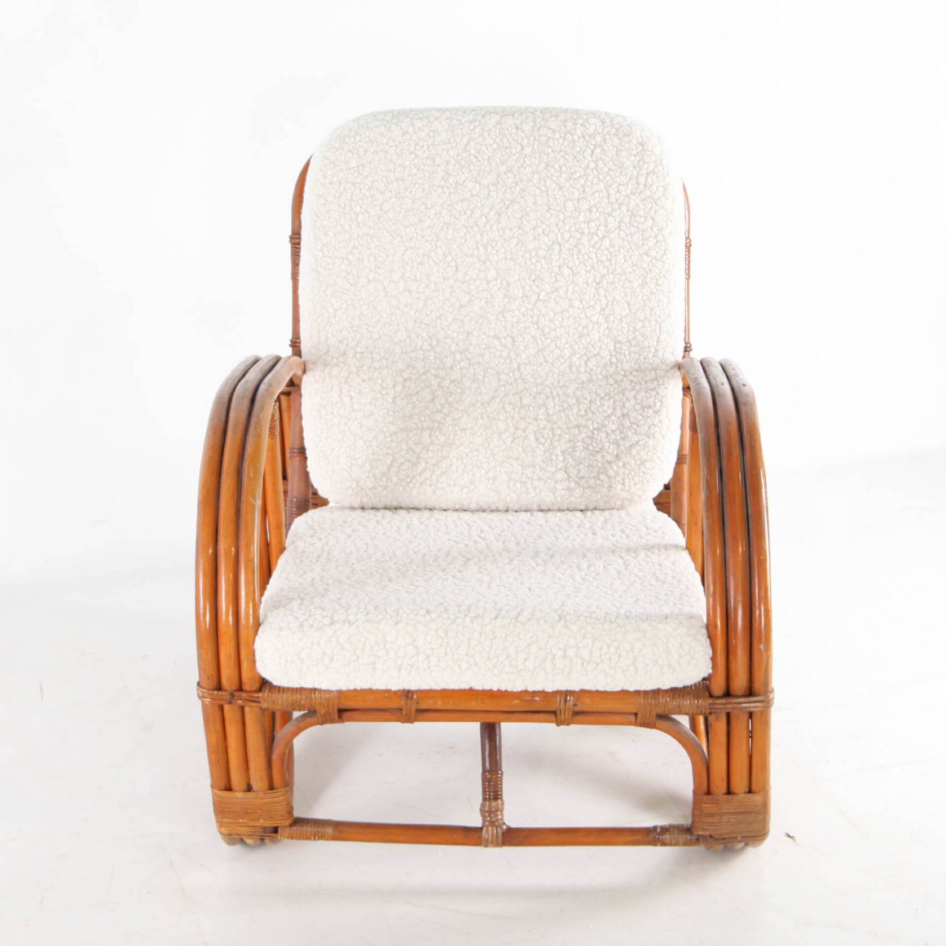 "Bretzel" armchair in rattan