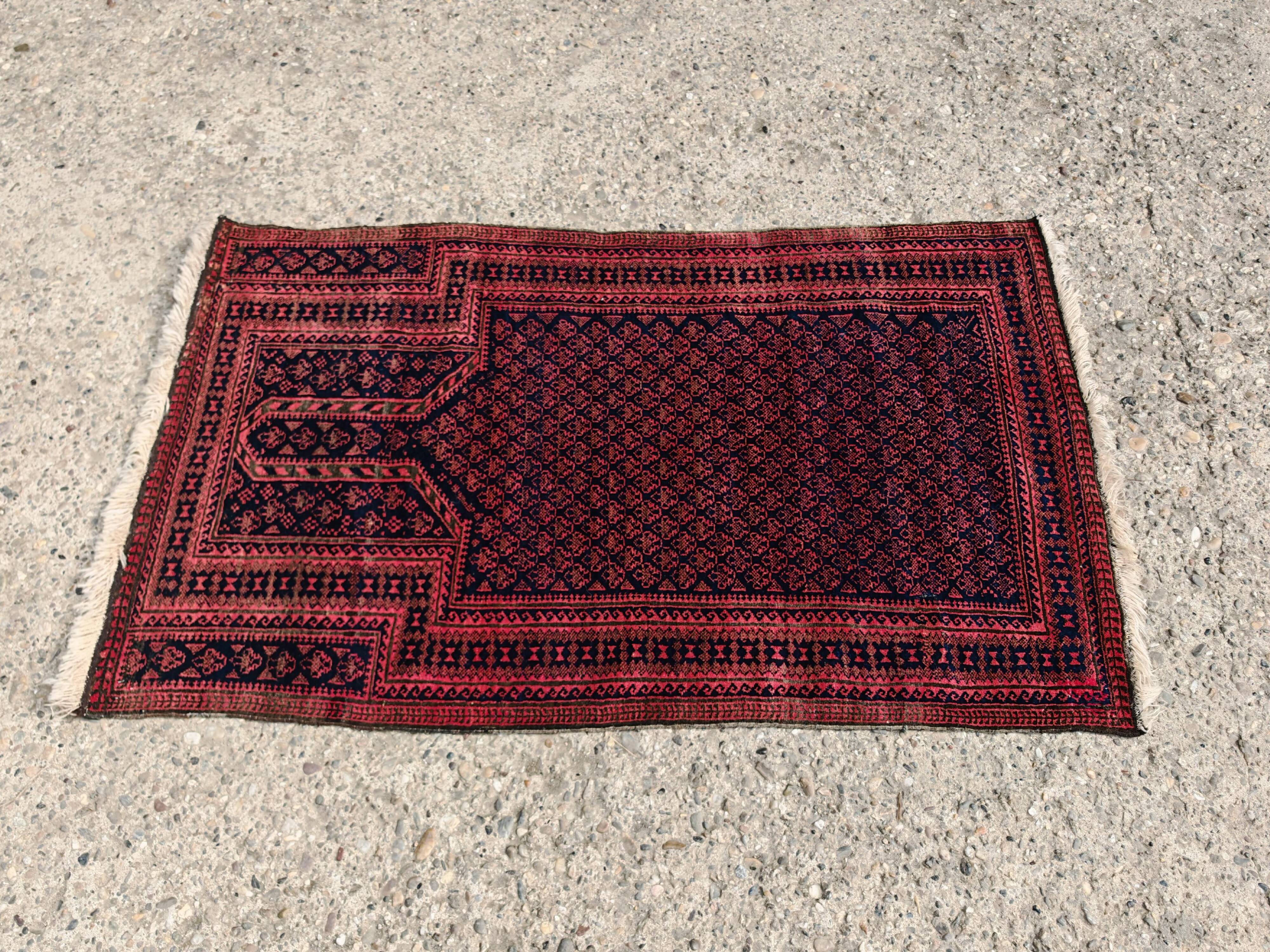 Vintage Persian Baluch prayer rug in wool from the 1950s.