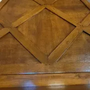 Important architectural fireplace made of solid wood, dating from the 19th century.