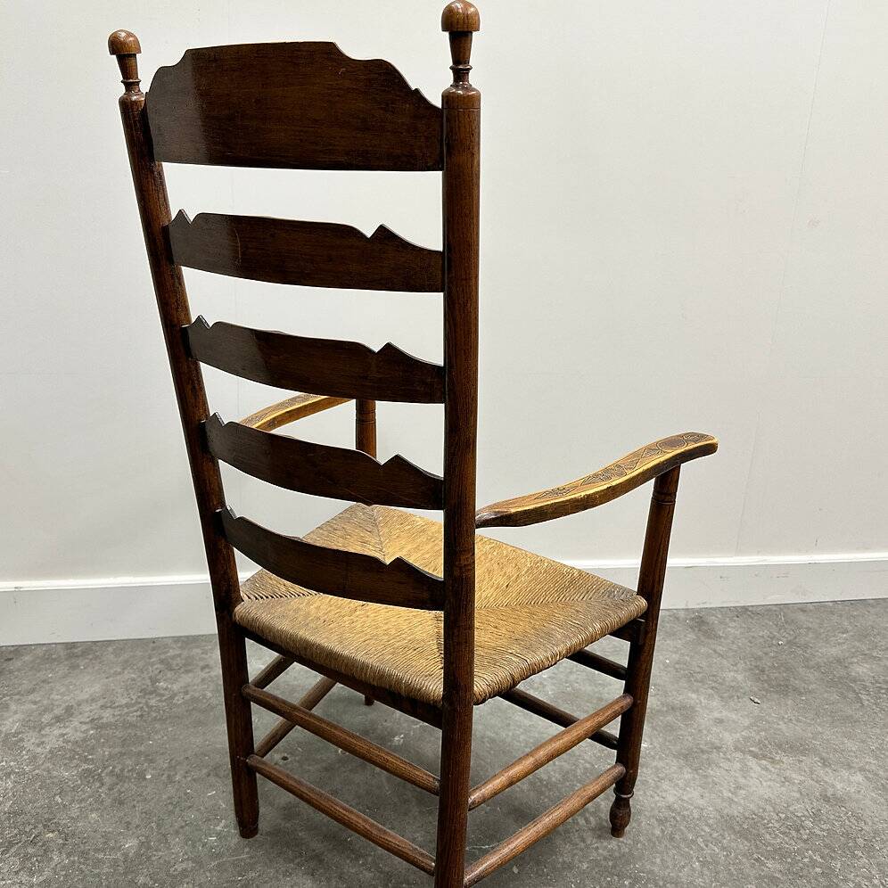 19th century handcrafted and carved ladder back chair, circa 1840s.