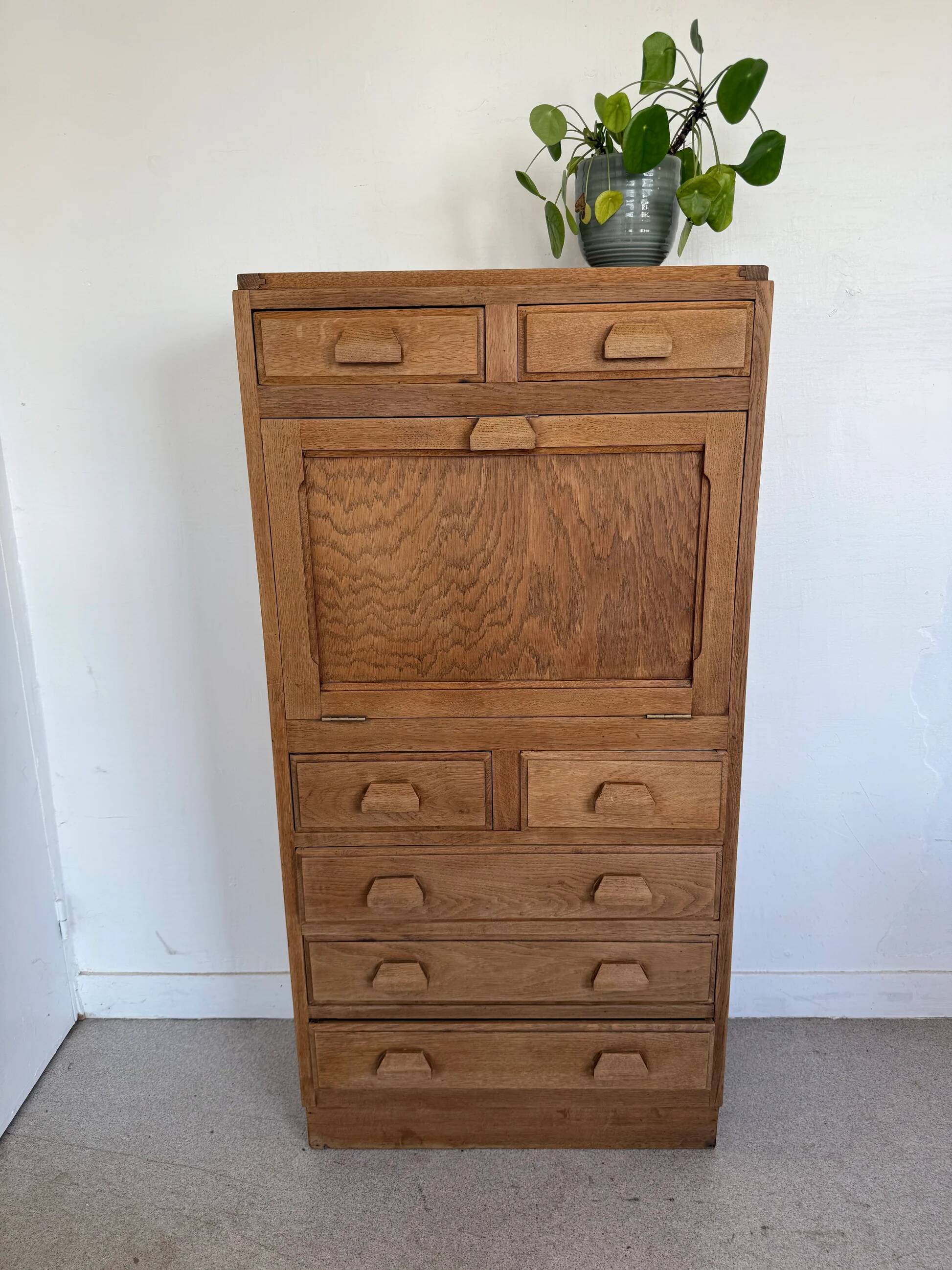 Vintage wooden secretary desk in the style of a professional piece of furniture