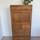 Vintage wooden secretary desk in the style of a professional piece of furniture