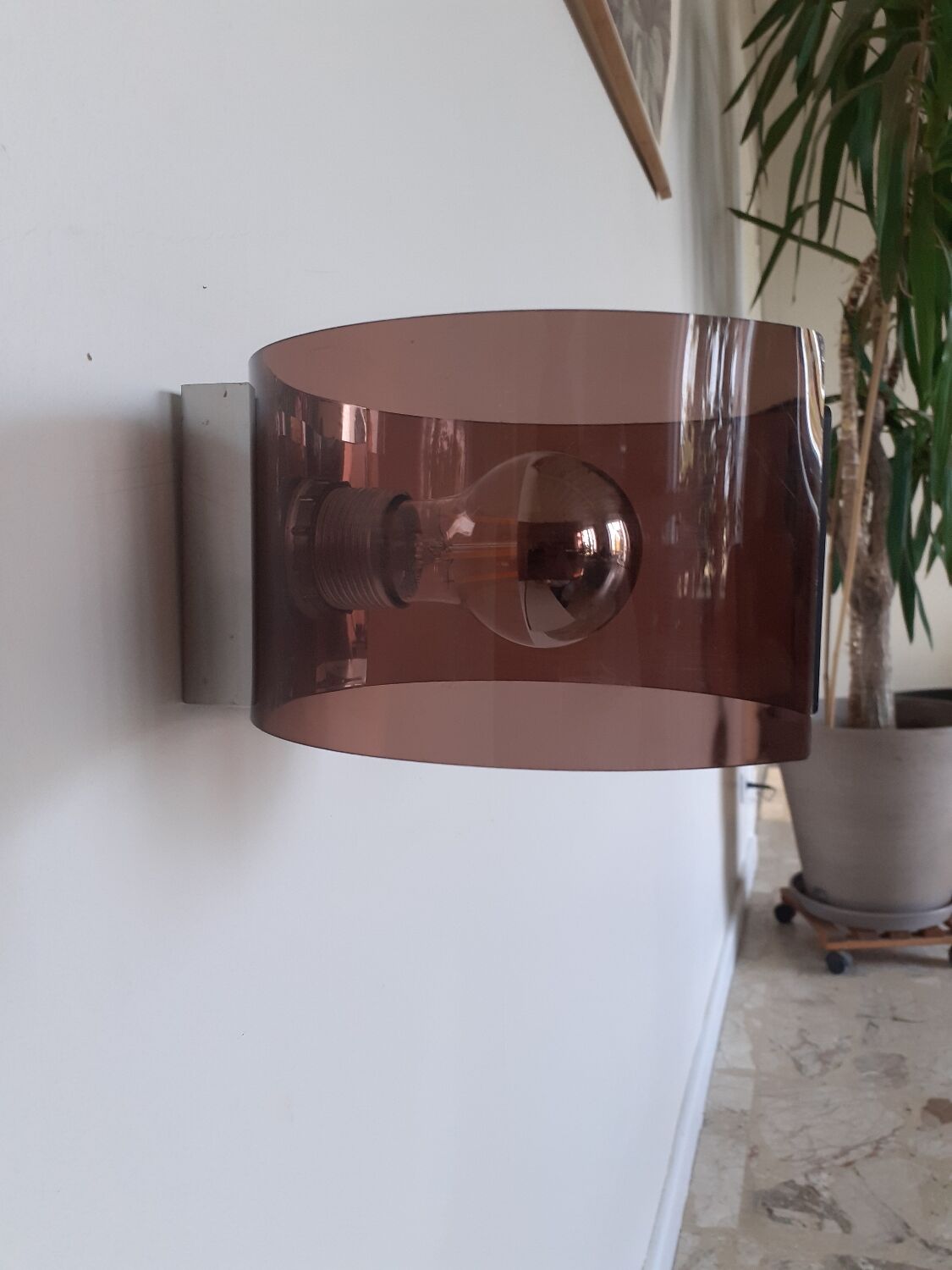 Space age plexiglass wall light.