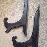 Old coat rack in blackened wood