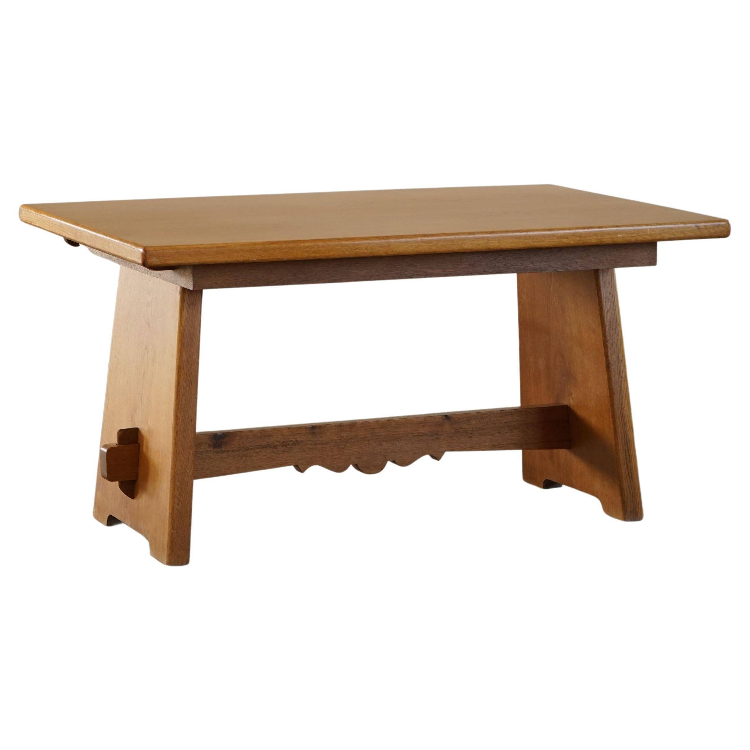 Mid-century brutalist dining table, made of oak, Danish craftsmanship, 1950s.