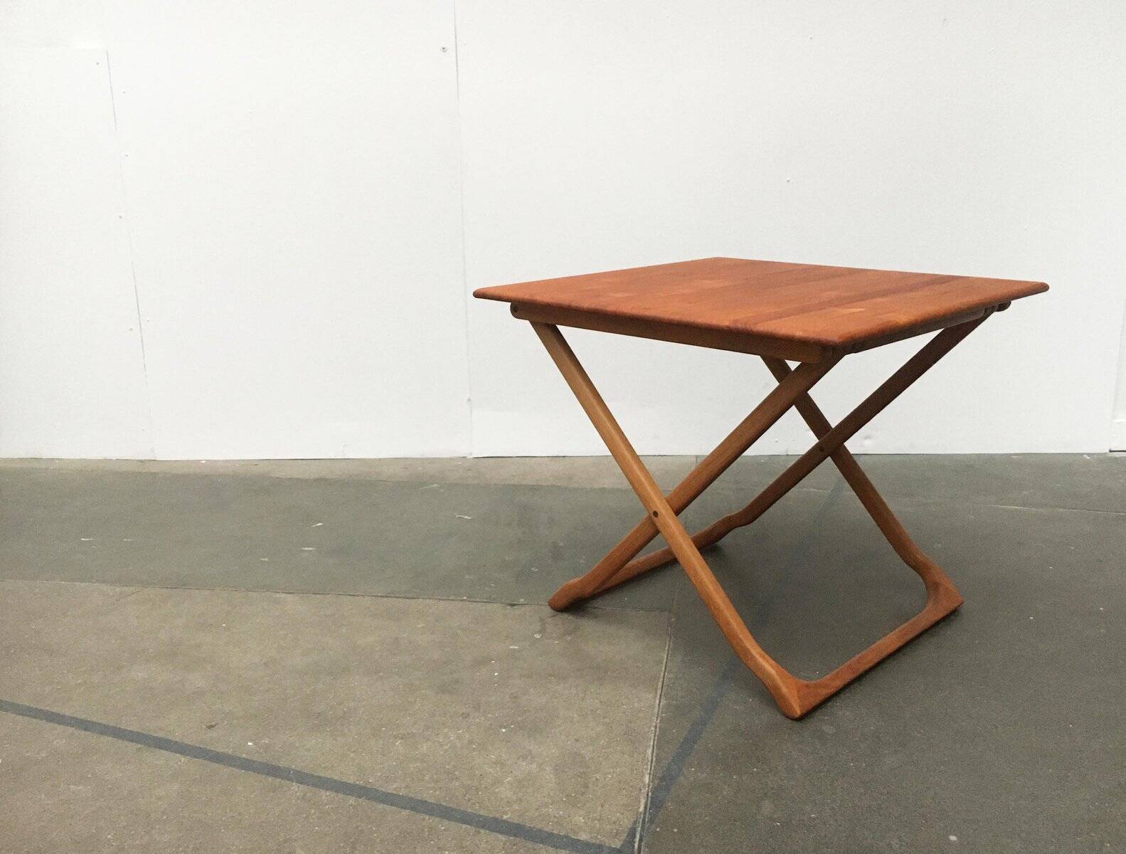 Danish folding table in teak from the mid-century by Juul Kristensen.