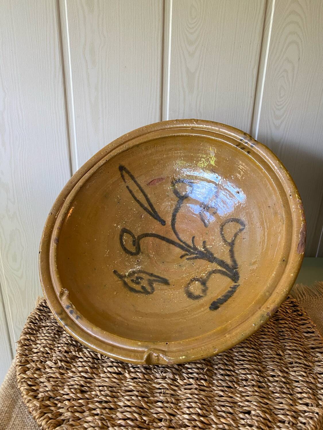 Old glazed terracotta dish