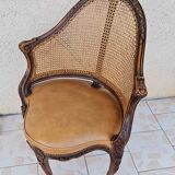 Fauteuil de bureau louis xv, sculpté, canné, garni cuir