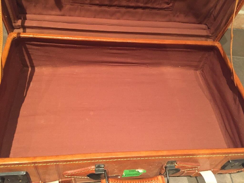 Thick leather suitcase