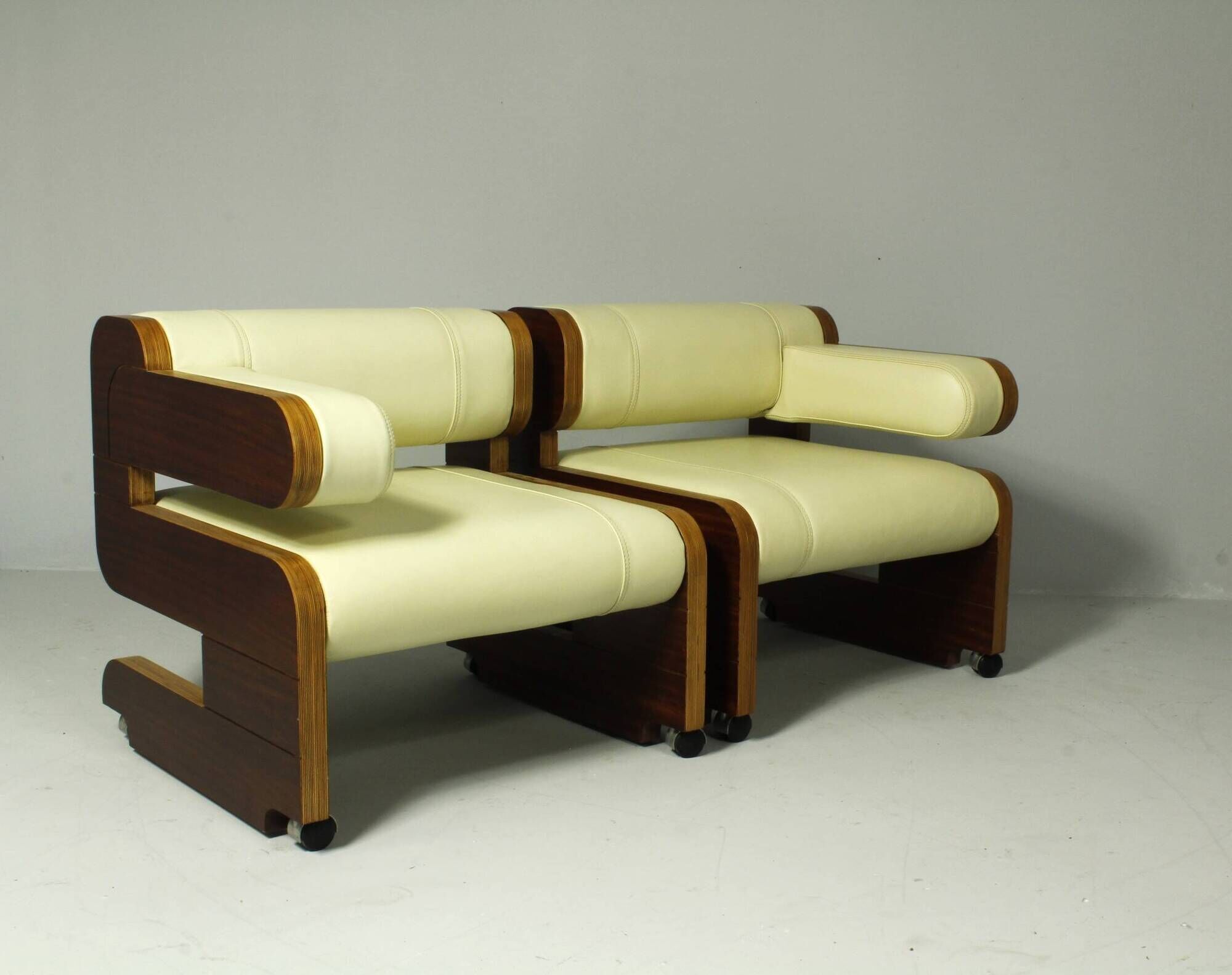 Pair of Mahogany Club Chairs upholstered in leather, 1970s