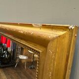 Old gilded fireplace mirror