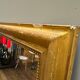 Antique gilded fireplace mirror