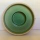 Green ceramic candle holder with a frieze