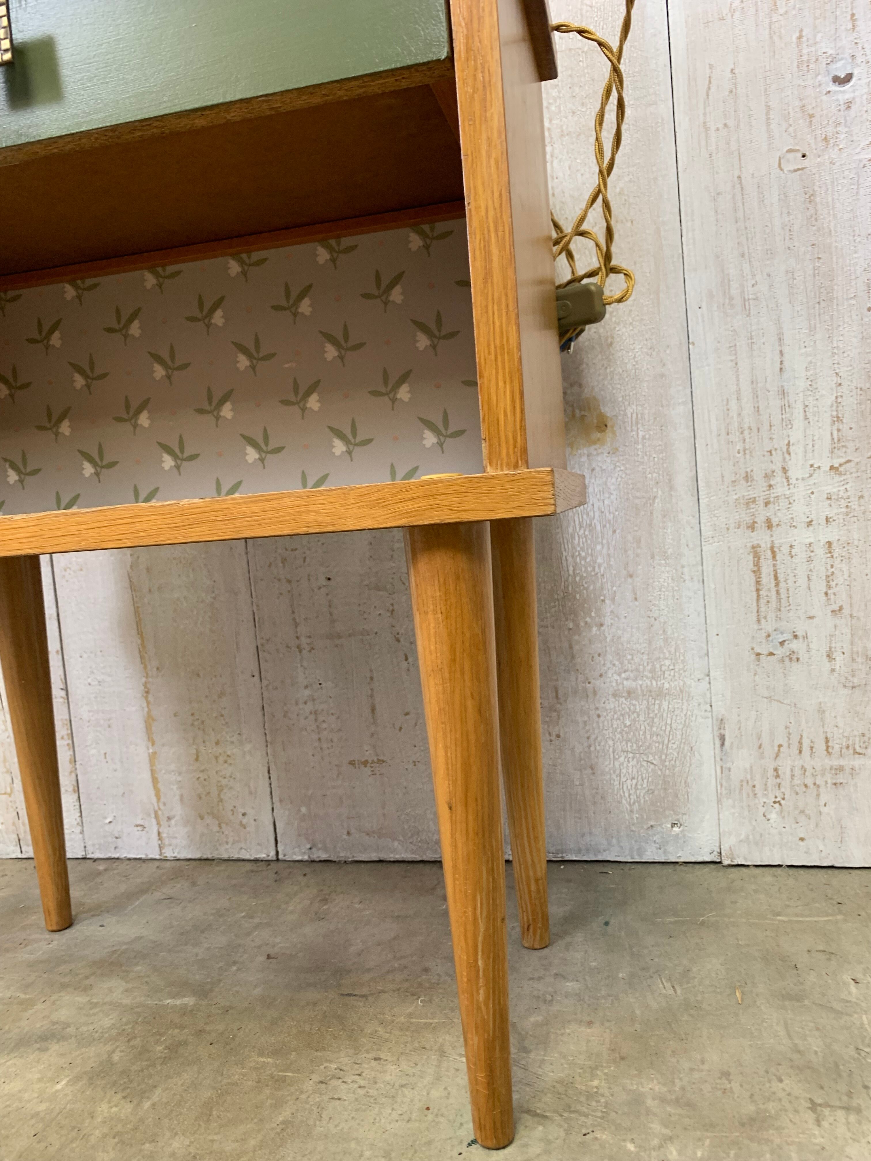 Bedside with tapered feet