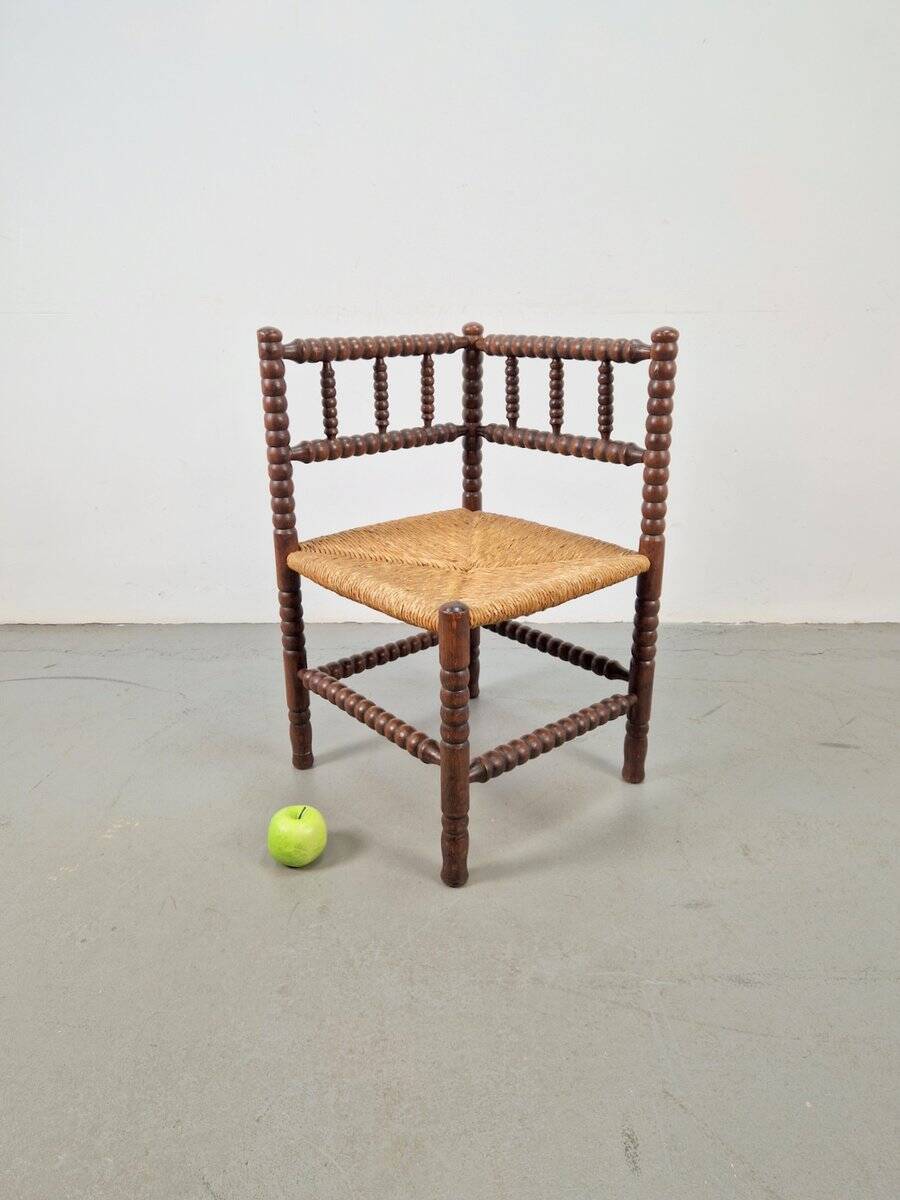 Corner chair in Arts and Crafts style made of oak with a rush seat, 1950s.