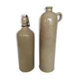 Pair of enamelled sandstone bottles
