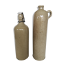 Pair of enamelled sandstone bottles