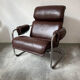 Midcentury tubular chromed chairs with leather cushions