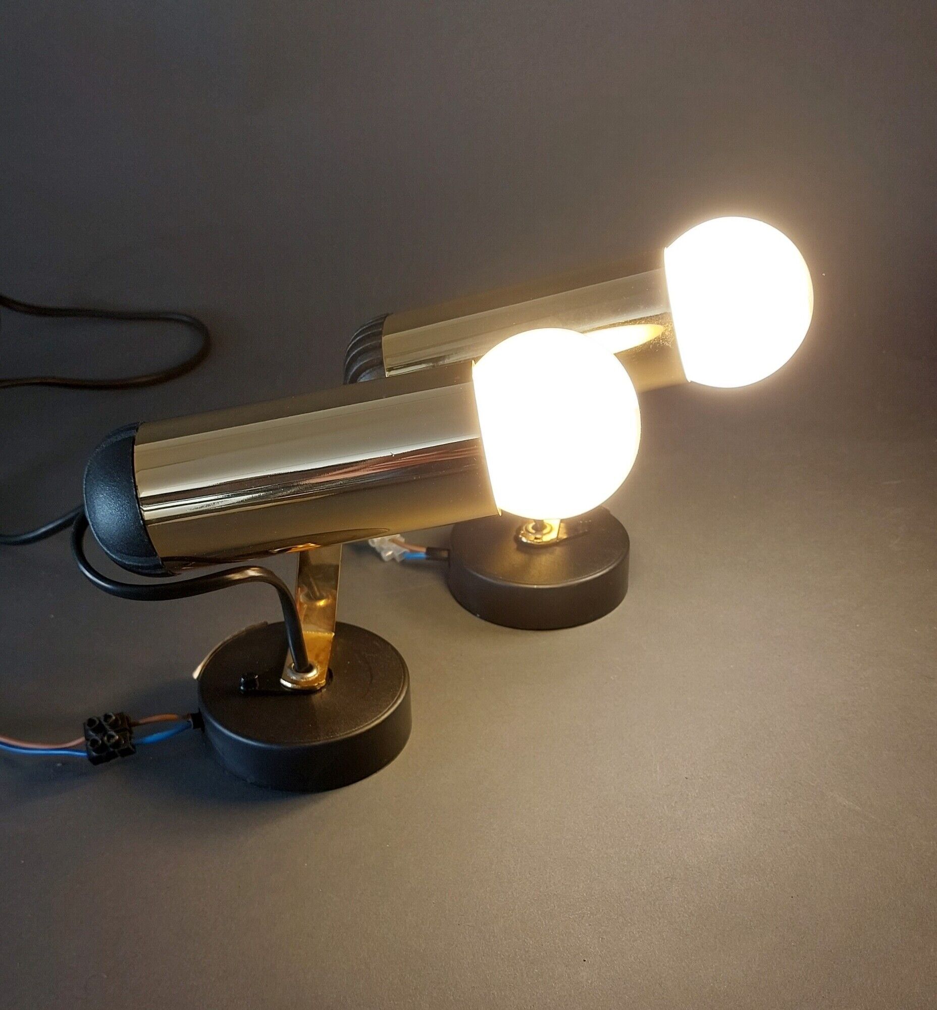 Pair of adjustable spotlight Maureva in gilded brass, Italian design 1980.