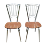 Paire de chaises en formica à dossier métal chromé en forme de lyre.