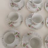 Haviland Limoges porcelain 10 coffee cups and 9 saucers with floral decoration.
