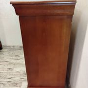 Wooden chest of drawers with a secret drawer