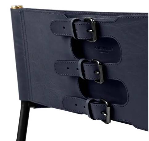 Pair of bar stools with navy blue backrest and metal frame.