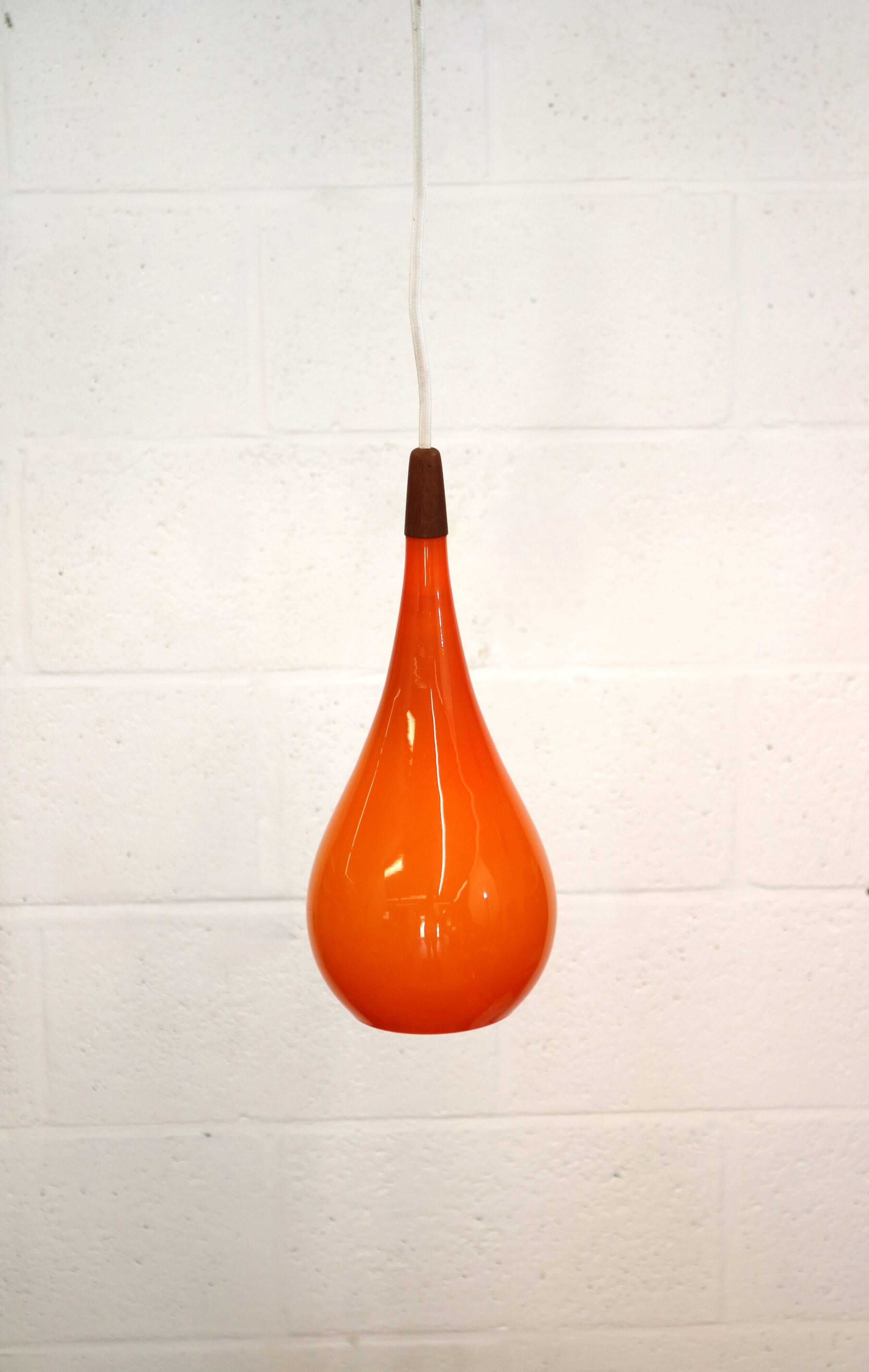 Orange teardrop glass pendant lamp made by Holmegaard - Denmark 1960