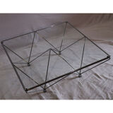 Minimalist coffee table in chrome metal and glass