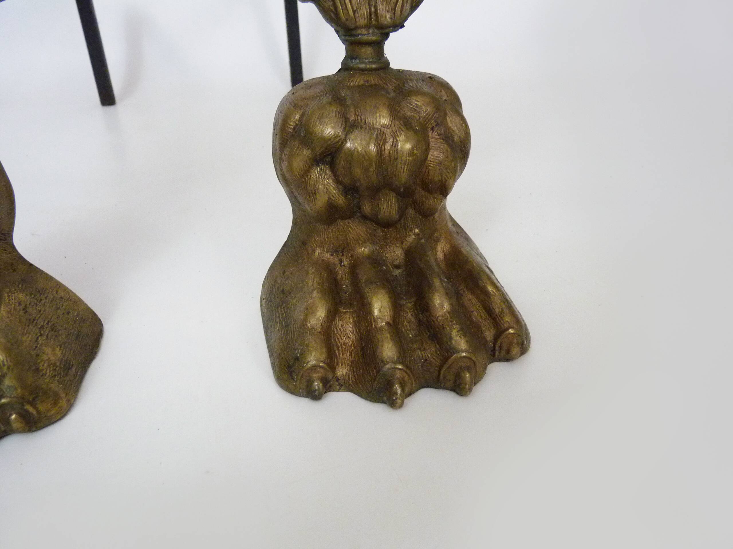Pair of bronze fire dogs with lion paws. Early 20th century.