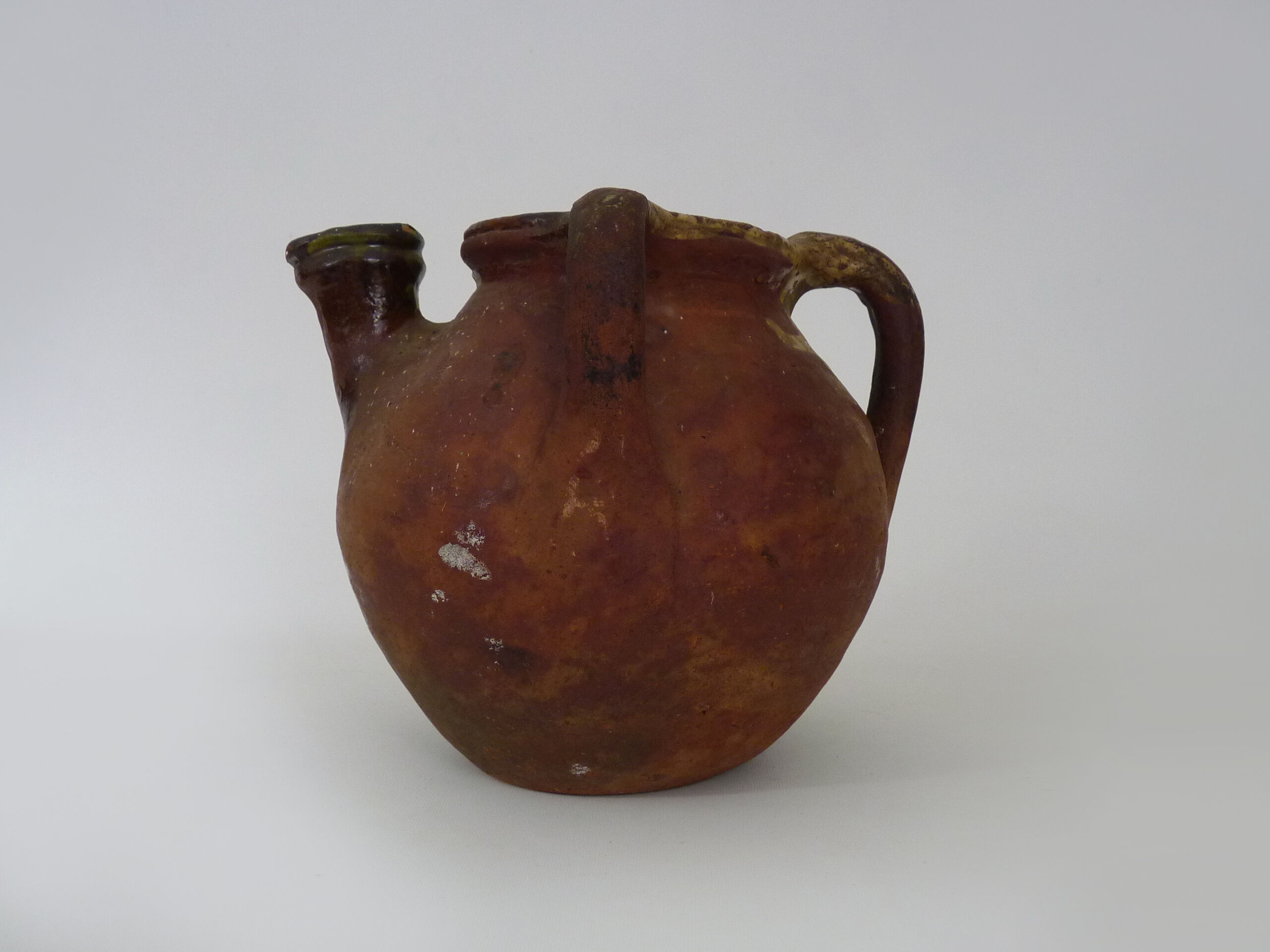 Old oil jug with 3 handles and spout. XIXth