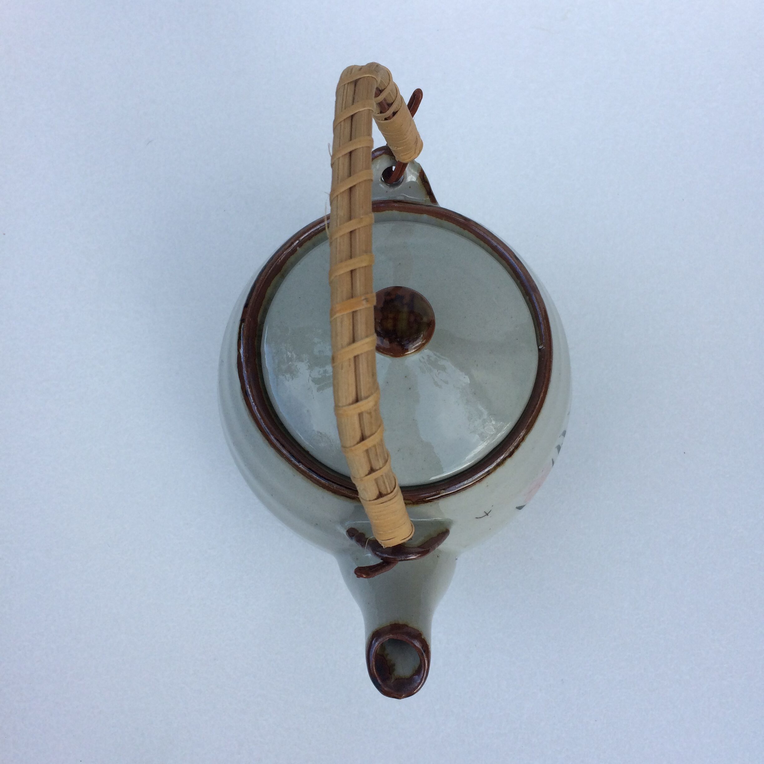 Vintage teapot wicker handle
