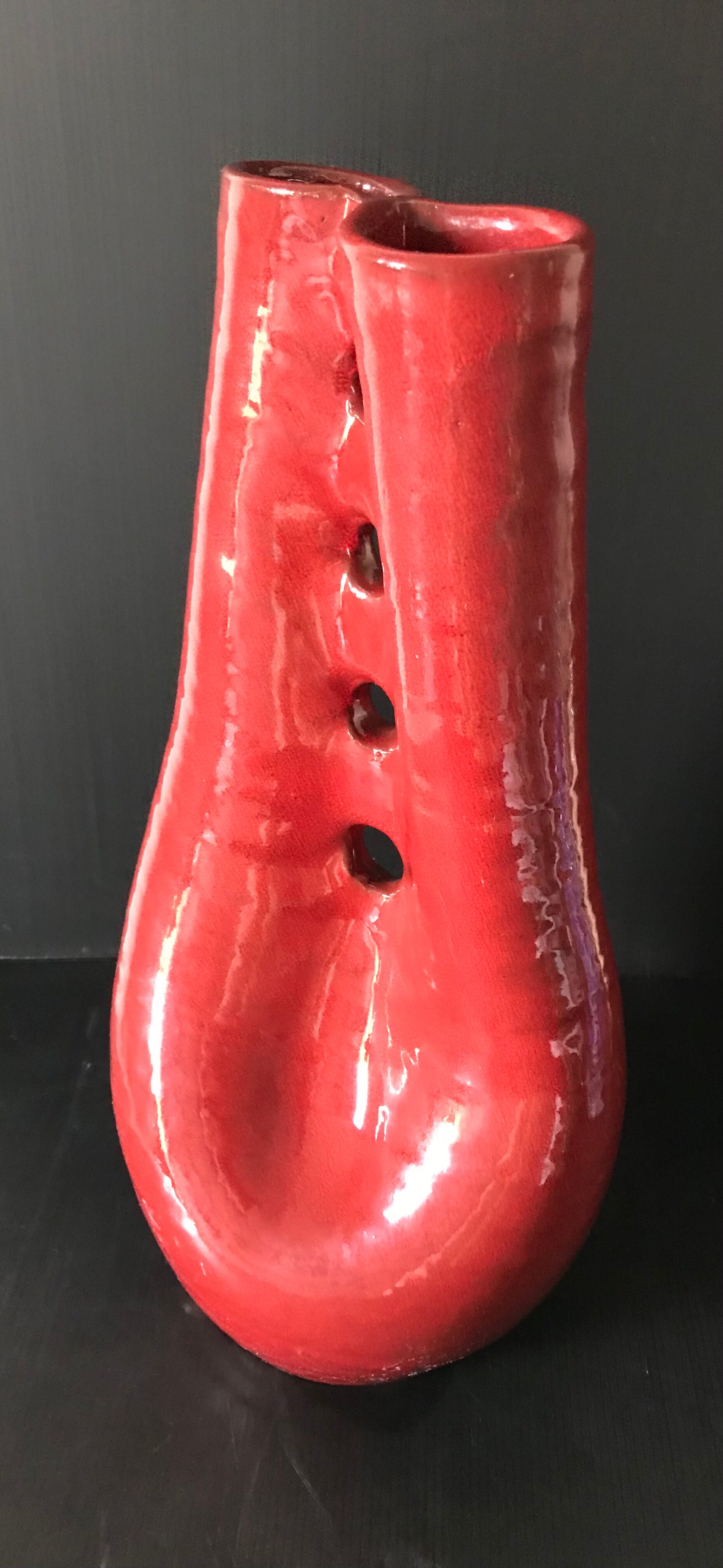Red ceramic vase