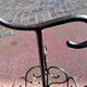 Antique wrought iron umbrella stand for entrance hall, vintage decor.
