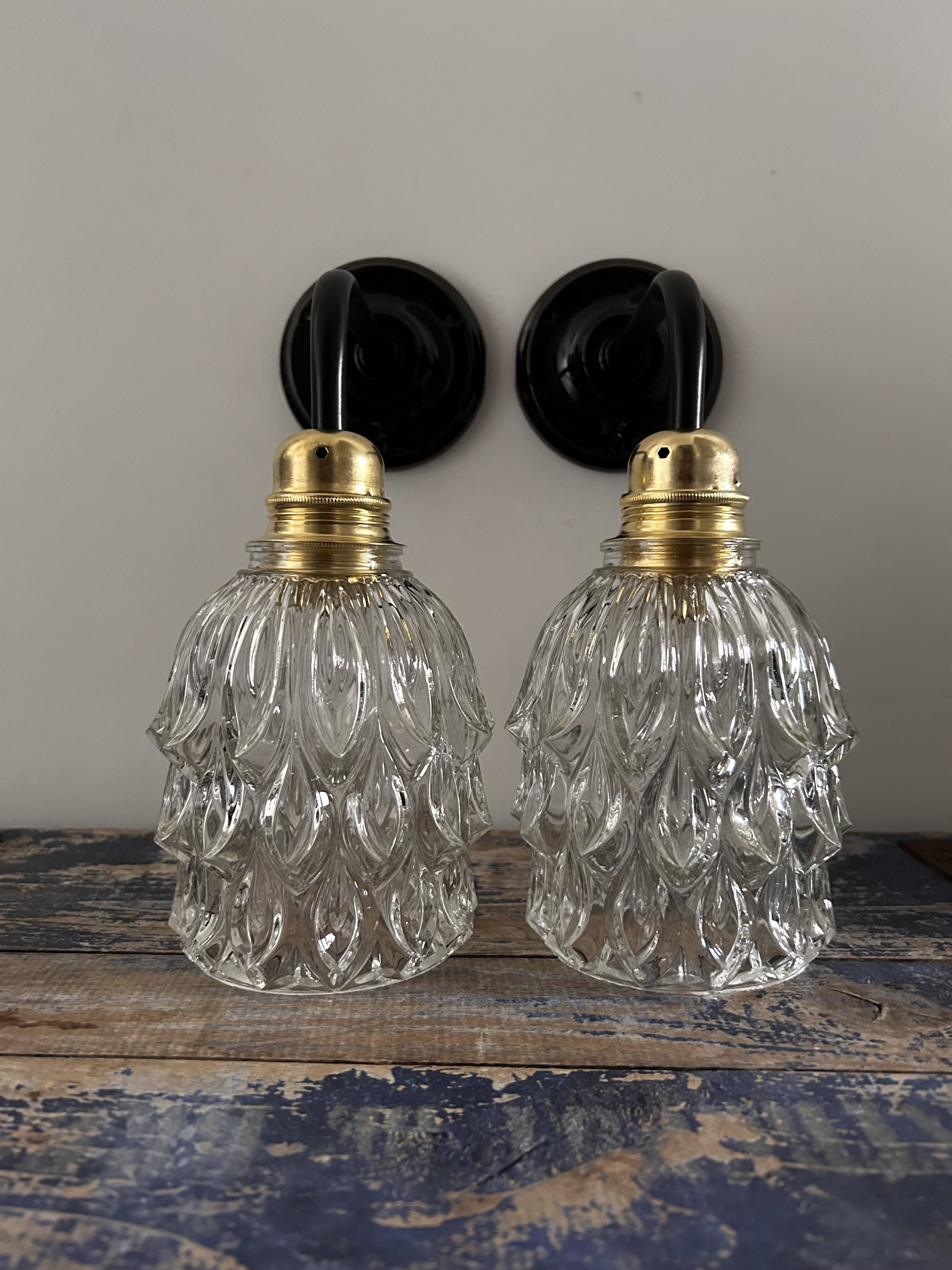 Pair of chiseled glass wall sconces