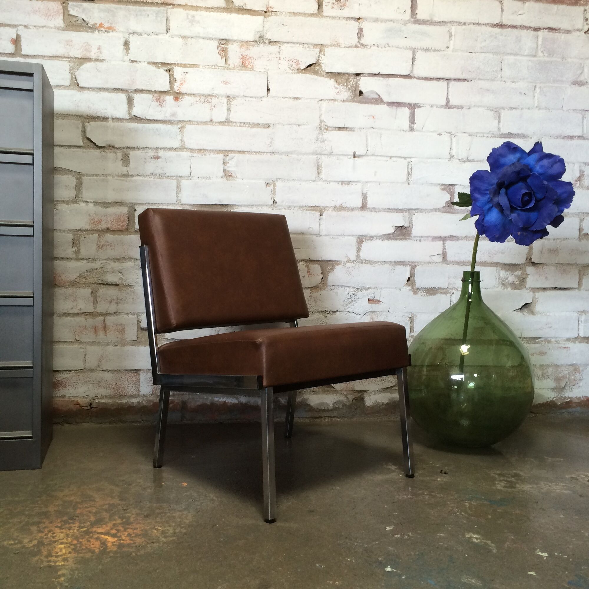 Modernist fireside chair / vintage chrome and skai armchair