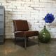 Modernist fireside chair / vintage chrome and skai armchair