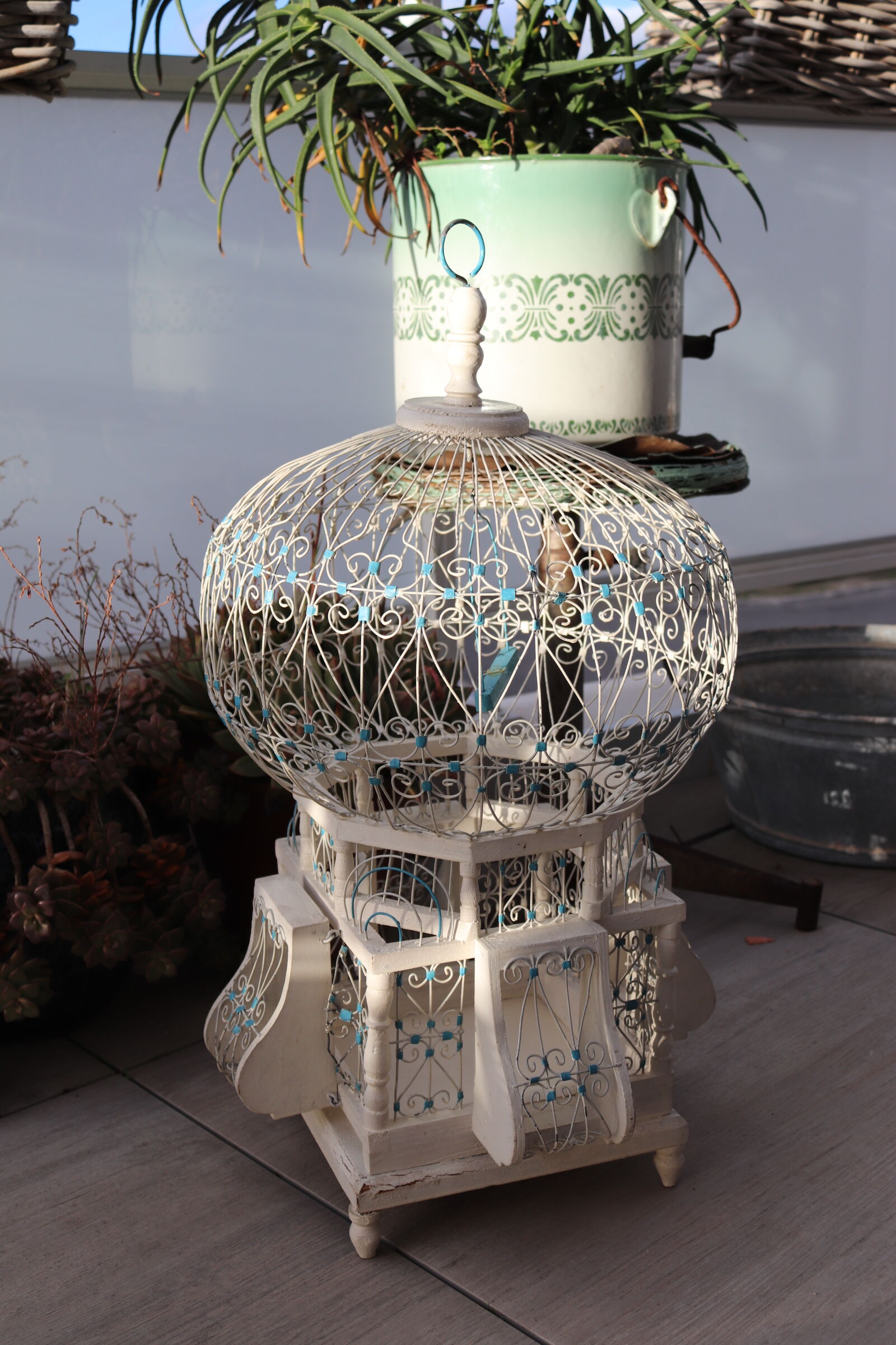 Vintage white and blue birdcage