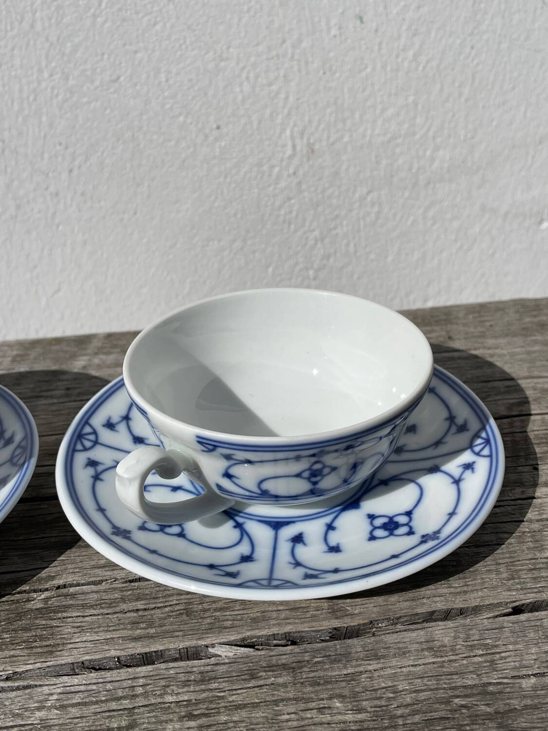 Pair of signed blue porcelain cups