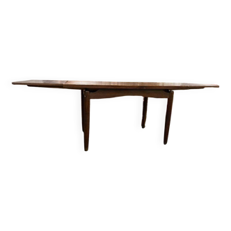 Vintage wooden dining table with extensions.