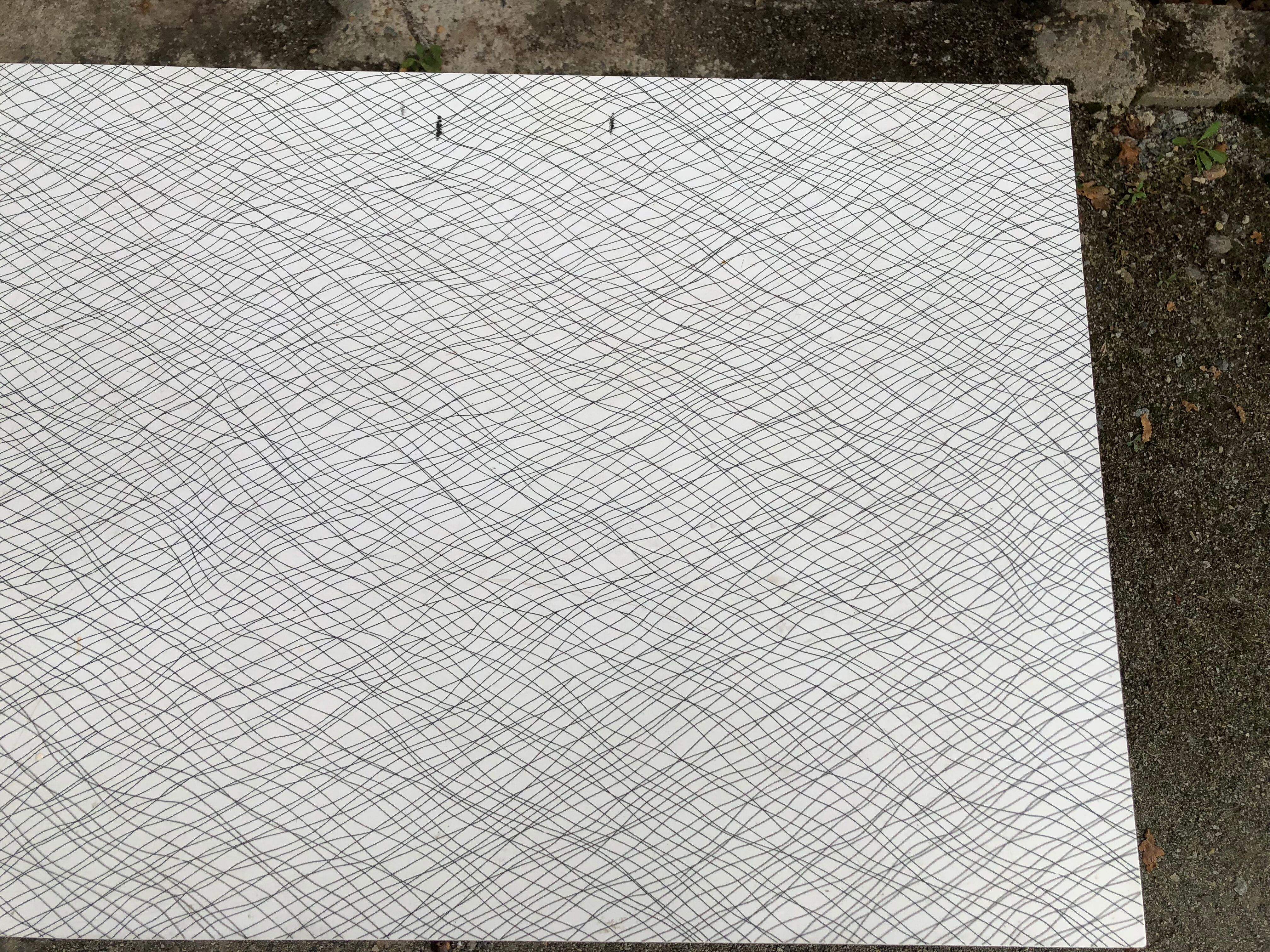 Vintage bistro table with an Art Deco style cast iron base and Formica top.