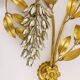 Large gold metal wall lamp in Hollywood Regency style by Hans Kögl, Maison Jansen.