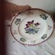 Set of 5 flat plates, signed Longwy.