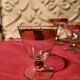 1930s footed glass service with gilding, including champagne flutes.