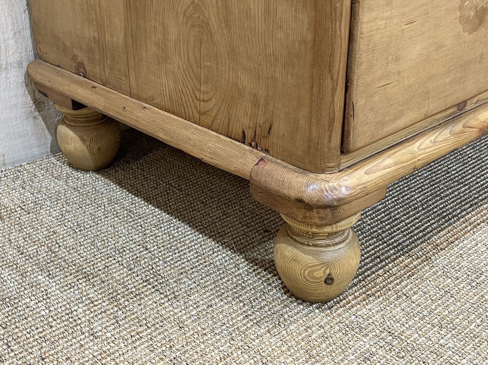 English chest of drawers in nineteenth century fir with its glass buttons
