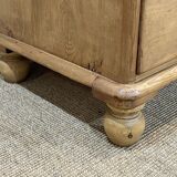 English chest of drawers in nineteenth century fir with its glass buttons