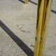 Nested tubular tables in gold metal.